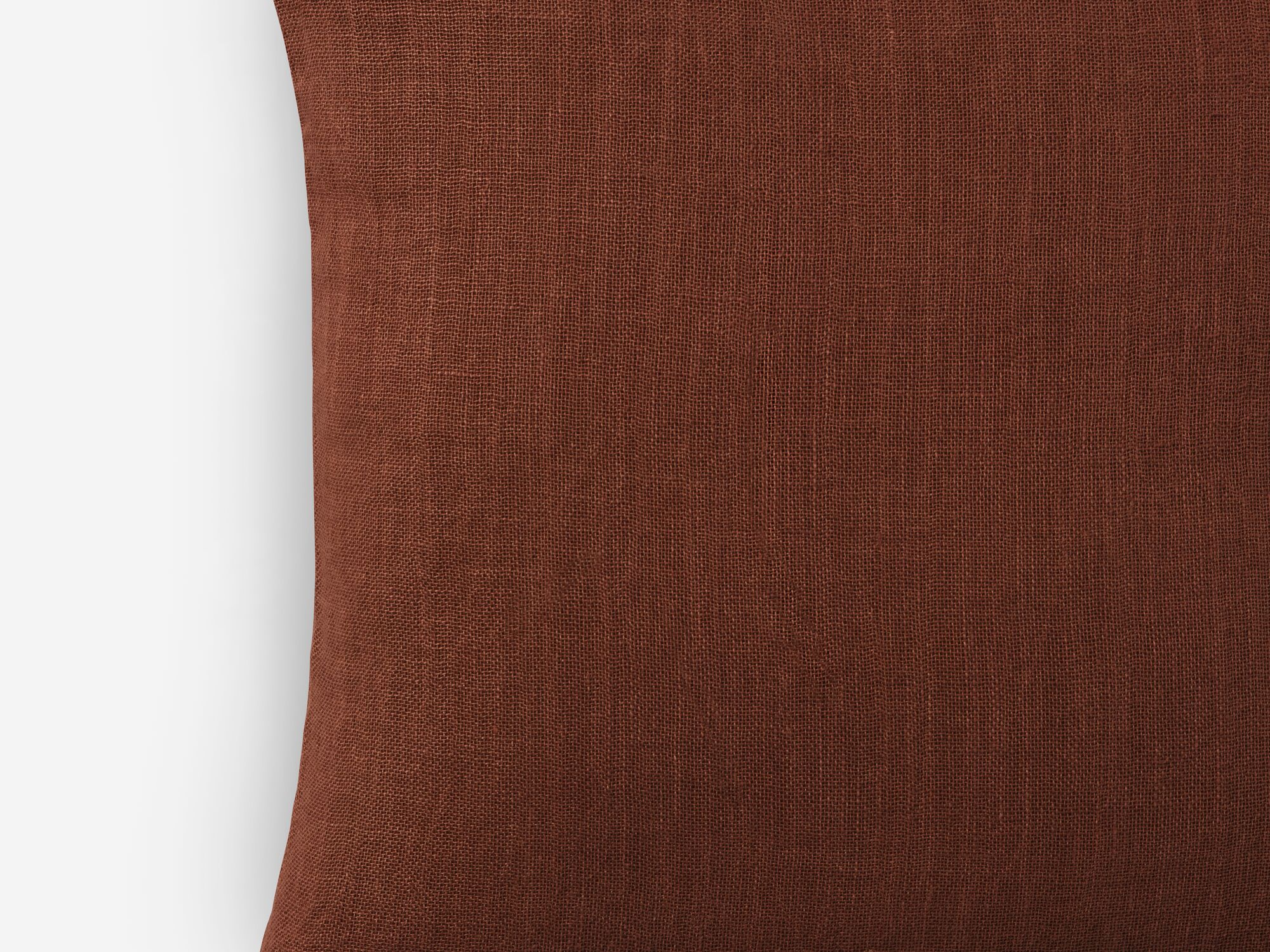 Detail view of red linen throw pillow